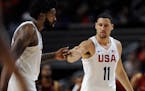 The United States' Klay Thompson (11) celebrated with DeAndre Jordan during the final seconds of an exhibition basketball game against Venezuela on Fr