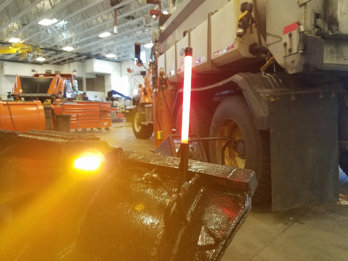 The Minnesota Department of Transportation is testing new lighted tubes marking the ends of snowplow blades to improve safety.