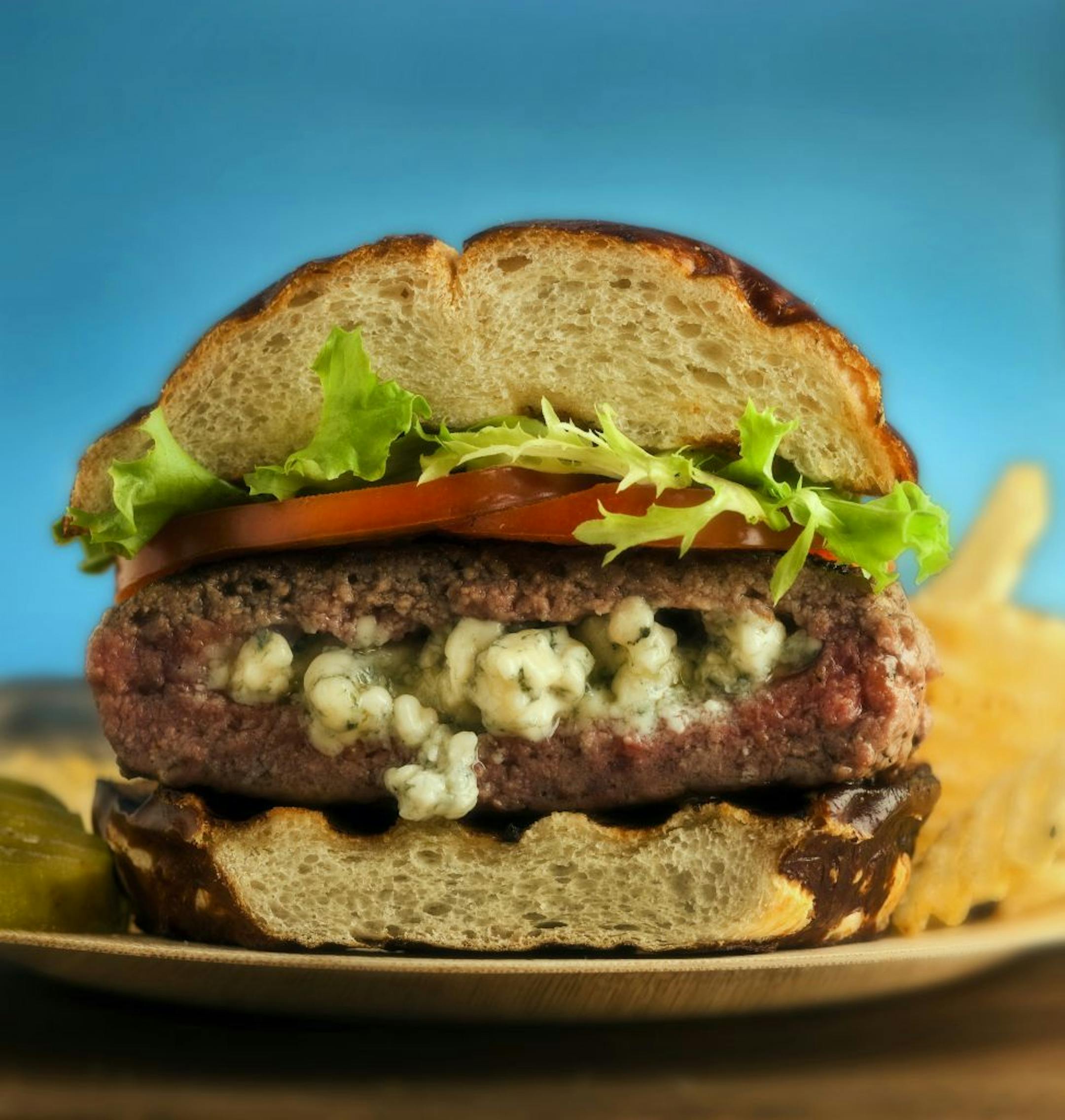 Up your grilling game by tucking a chunk of cheese, a spoonful of sauteed mushrooms or some chopped grilled red pepper inside your patties.