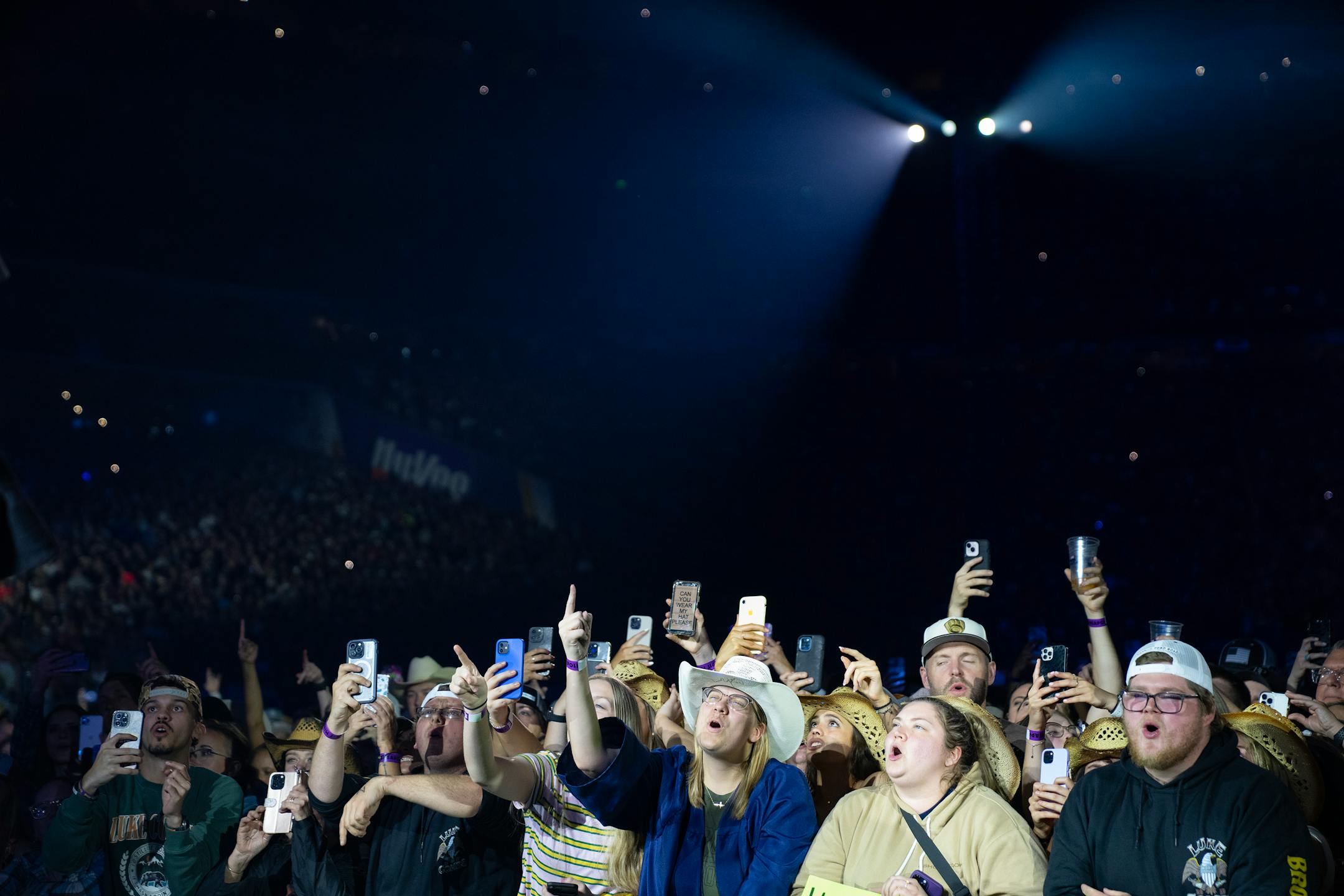 The audience watches and sings along as Luke Combs performs at U.S. Bank Stadium.