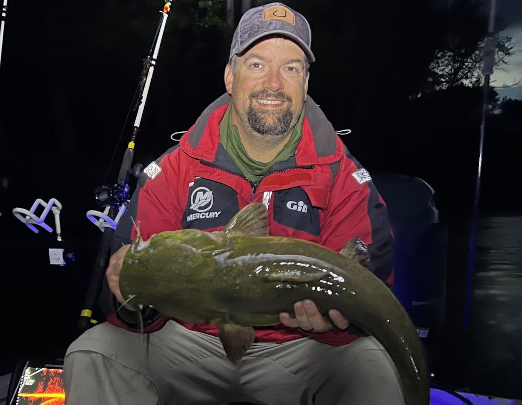 Brandon Nyquist of Belle Plaine, Minn., is a river guide who plies the Minnesota, Snake, Rum and St. Croix waterways with clients, many of whom are looking for catfish and sturgeon.