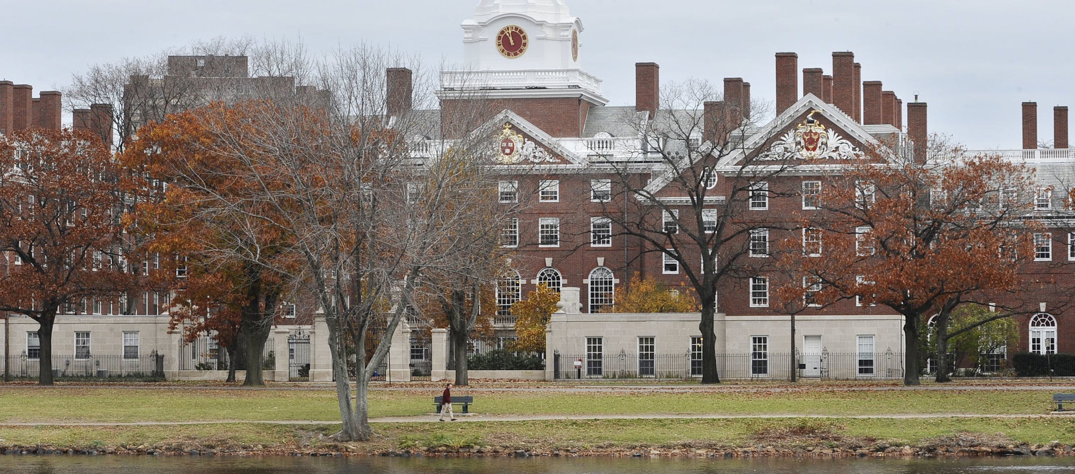 FILE - This Nov. 13, 2008 file photo shows the campus of Harvard University in Cambridge, Mass. Harvard University is taking new steps to confront its past ties to slavery. The Ivy League school is hosting a conference Friday, March 3, 2017, exploring the historical ties between slavery and early universities, including Harvard. (AP Photo/Lisa Poole, File)