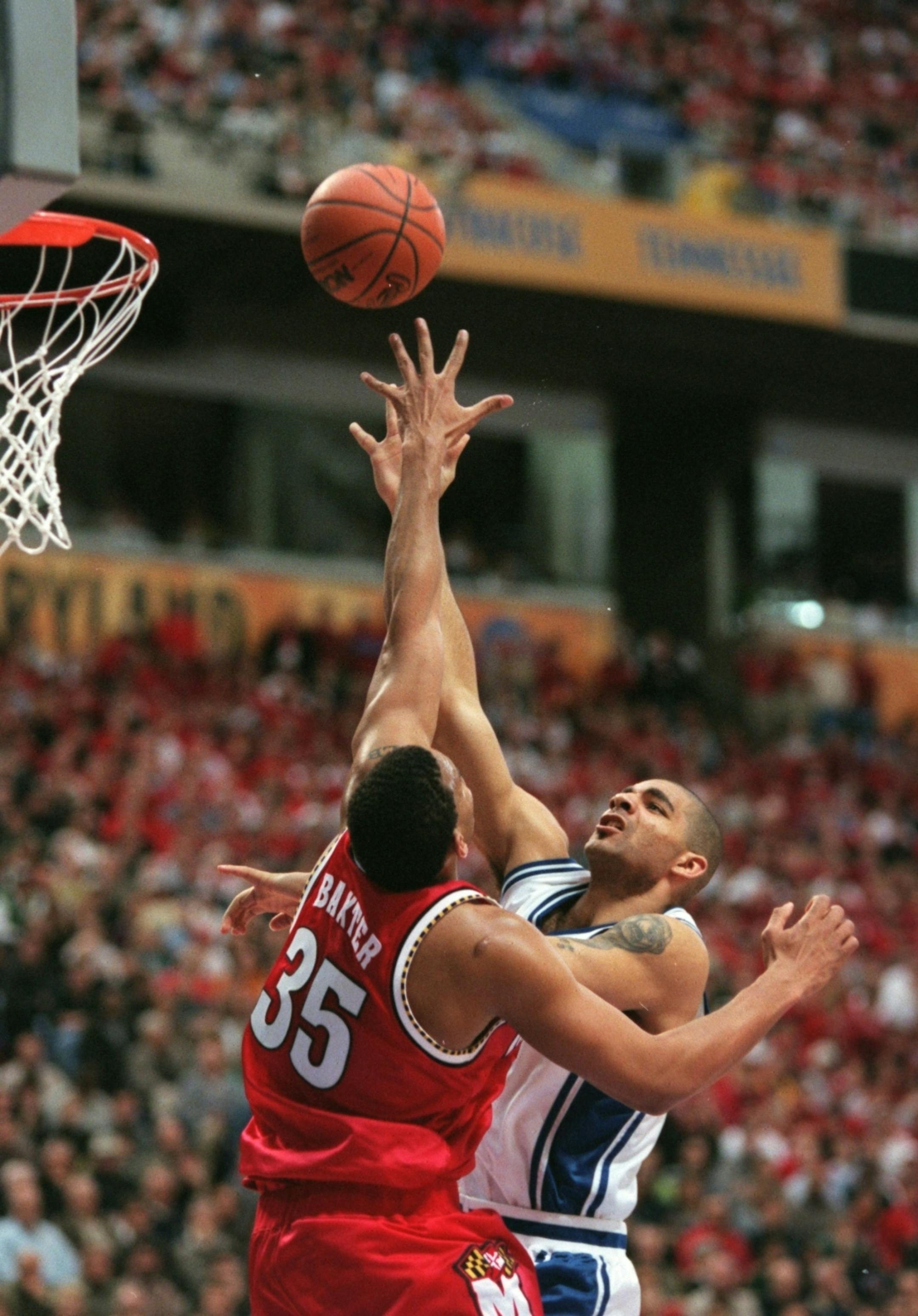 Duke University's Carlos Boozer, right, shoots over Maryland's Lonny Baxter in the 2001 Final Four. (Jerry Holt/Star Tribune)