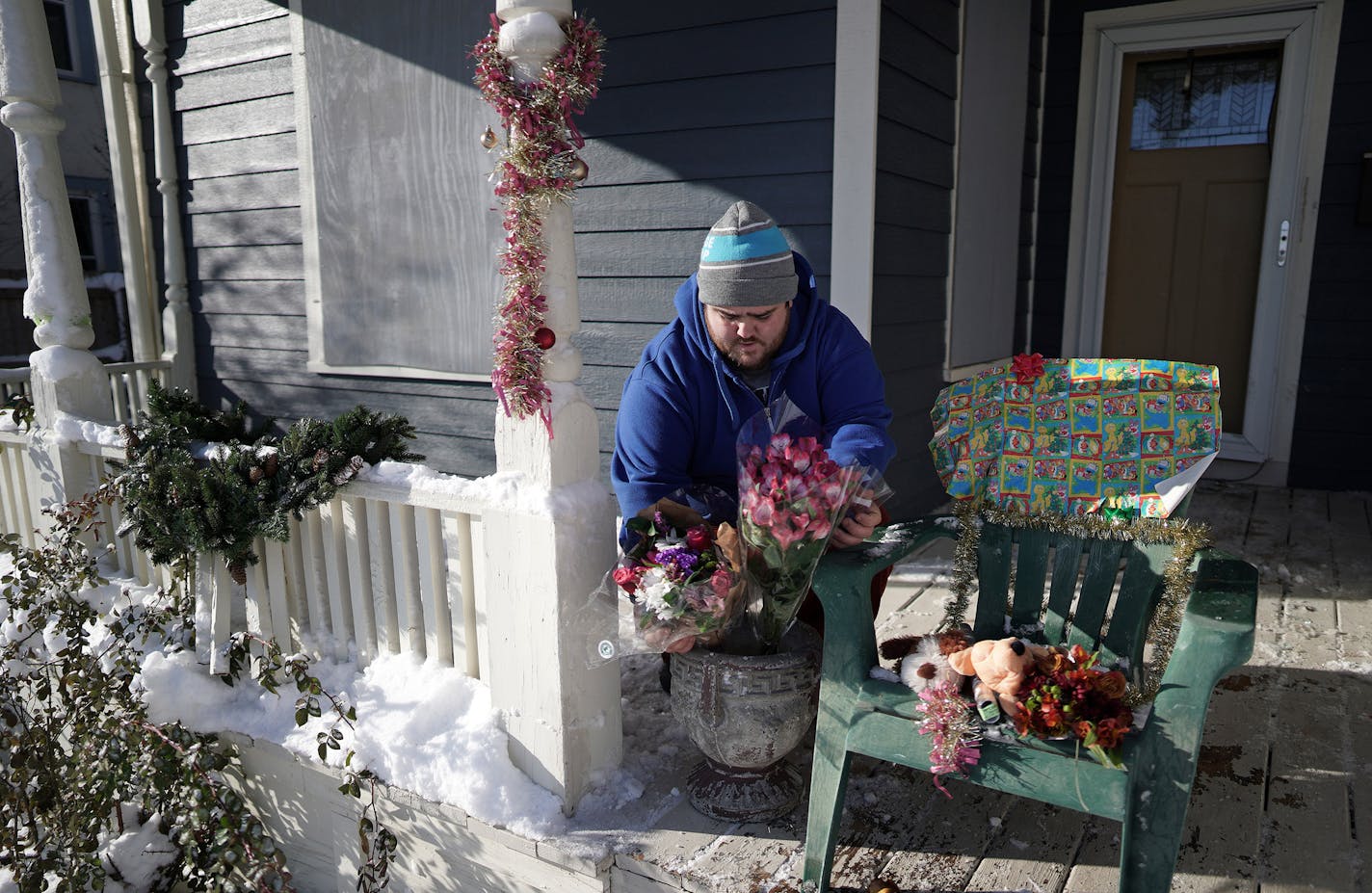 Neighbor Eric Stiver put flowers and stuffed animals on a chair on the porch of the home where David Schladetzky shot and killed Kjersten Schladetzky and her sons, William and Nelson on Sunday. ] brian.peterson@startribune.com
Minneapolis, MN
Monday, December 2, 2019