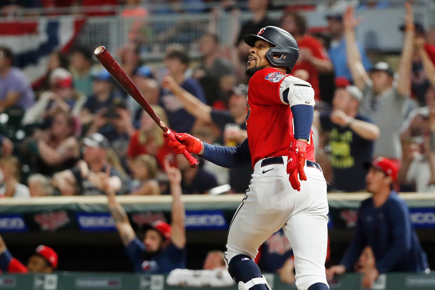 Minnesota Twins' Byron Buxton watches his two-run home run against the Baltimore Orioles during the ninth inning of a baseball game Friday, July 1, 2022, in Minneapolis. The Twins won 3-2. (AP Photo/Bruce Kluckhohn)