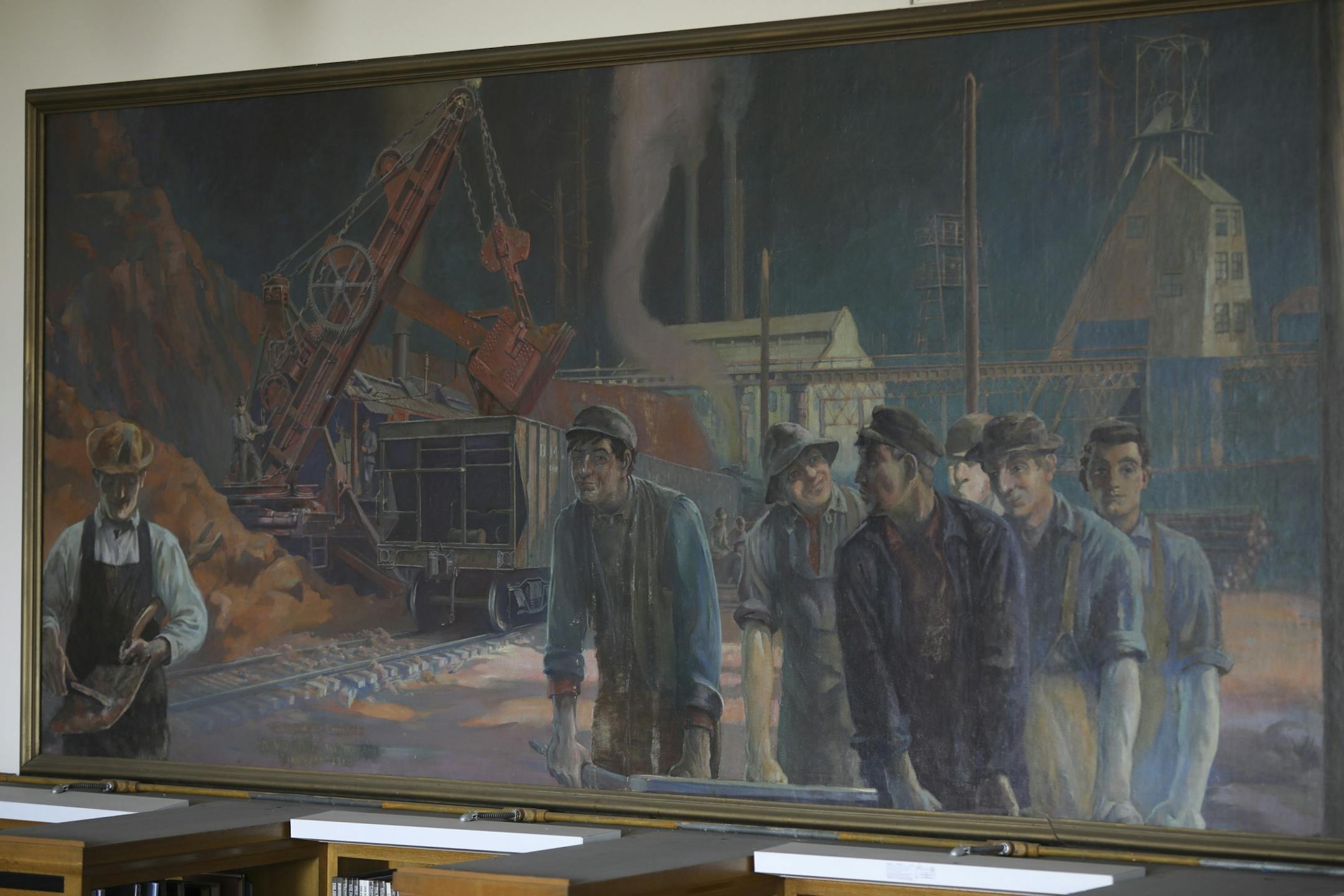 Detail of the 60 foot long mural "The Iron Industry," located in the library of Hibbing High school, features the story of ore as told by artist David Tice Workman.
