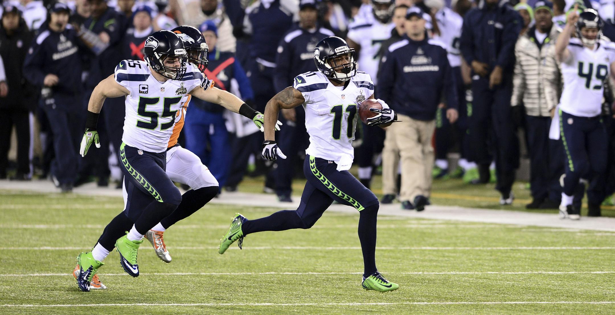 Seattle Seahawks wide receiver Percy Harvin (11) returns the opening kickoff of the second half for a touchdown during the NFL Super Bowl XLVIII football game at MetLife Stadium in East Rutherford, N.J., Feb. 2, 2014. (Ben Solomon/The New York Times)