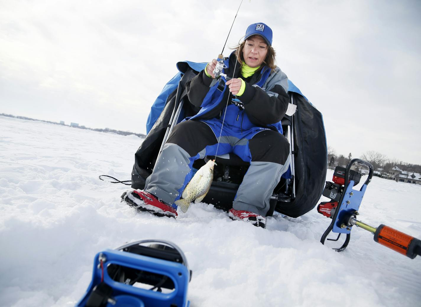 Shelly Holland spent sometime ice fishing on Medicine Lake Sunday March 9, 2014 in Plymouth , Minnesota . ] JERRY HOLT jerry.holt@startribune.com Jerry Holt