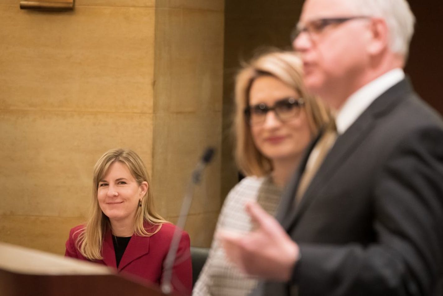 Current Minnesota House Minority Leader Melissa Hortman smiled as she watched Gov.-elect Tim Walz and Lt. Gov.-elect Peggy Flanagan as they spoke at a budget forecast news conference Thursday.