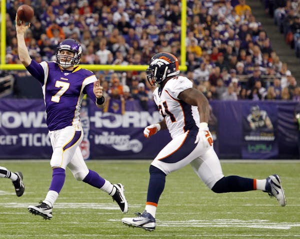 Vikings quarterback Christian Ponder was on the run against Denver. His two interceptions led to 10 points for the Broncos.