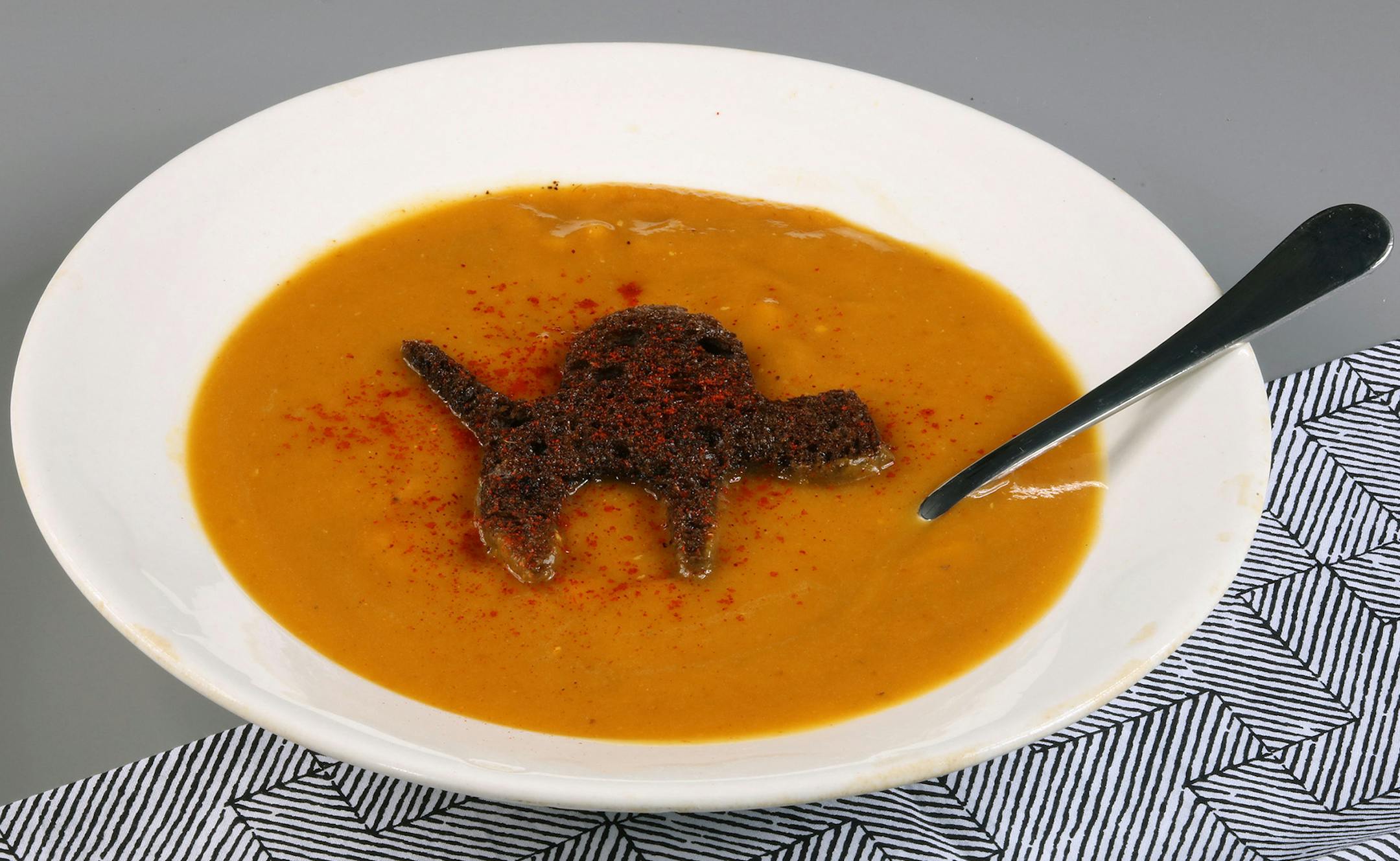 Pumpernickel bread cut in cubes or a scary Halloween shape (pull out those cookie cutters), then toasted in butter and tossed with smoky Spanish paprika. (E. Jason Wambsgans/Chicago Tribune/TNS) ORG XMIT: 1175548