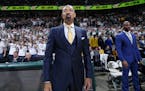 Michigan coach Juwan Howard watches before an NCAA college basketball game against Michigan State, Sunday, Jan. 5, 2020, in East Lansing, Mich. Michig