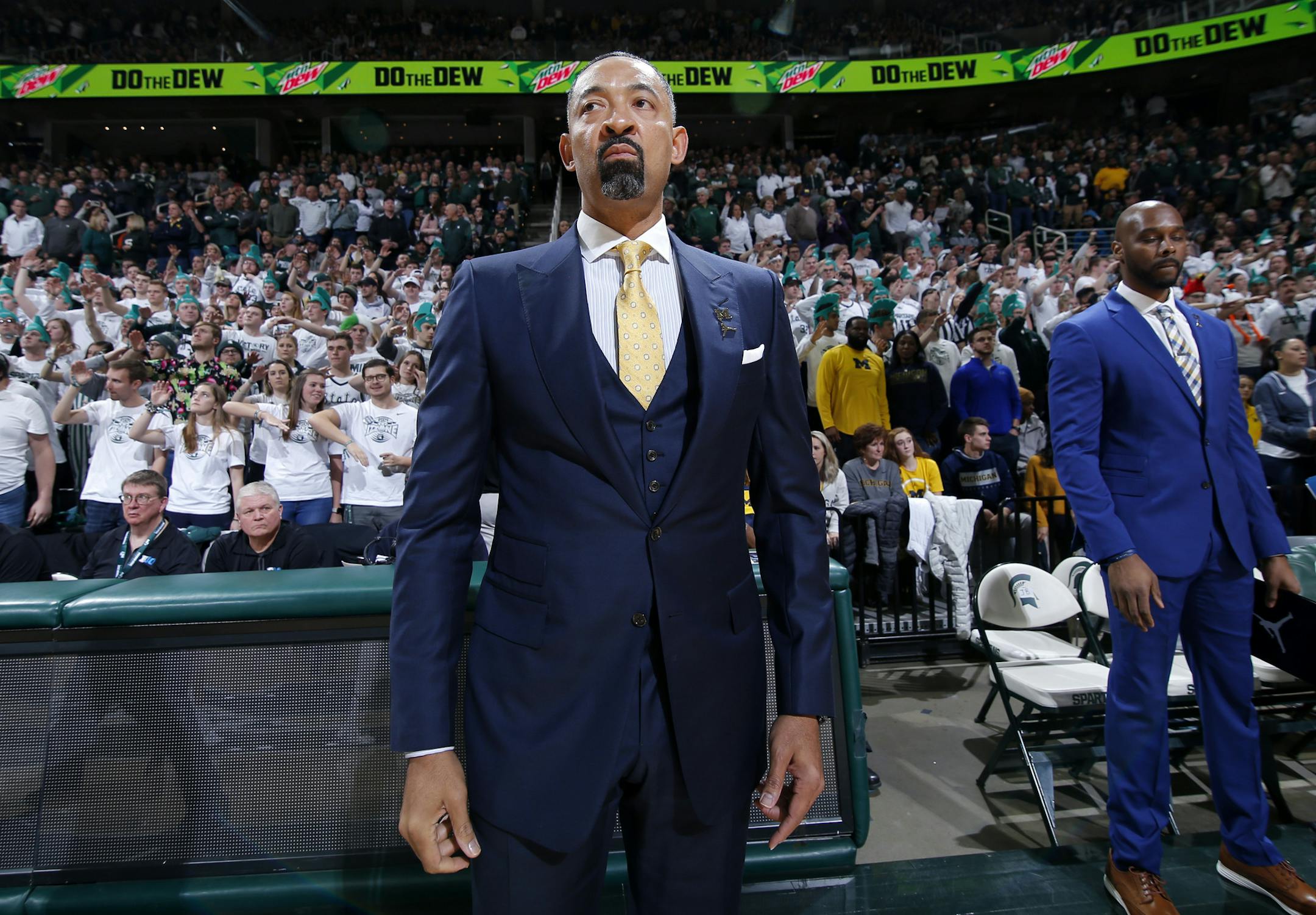 Michigan coach Juwan Howard watches before an NCAA college basketball game against Michigan State, Sunday, Jan. 5, 2020, in East Lansing, Mich. Michigan State won 87-69. (AP Photo/Al Goldis)
