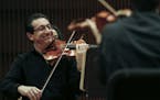 Associate Concertmaster Ruggero Allifranchini seemed to be pleased during the Saint Paul Chamber Orchestra's first rehearsal in the Ordway's nearly co