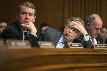 Sen. Al Franken (D-Minn.) listens to Betsy DeVos, Donald Trump�s nominee for education secretary, at her Senate Health, Education, Labor and Pension