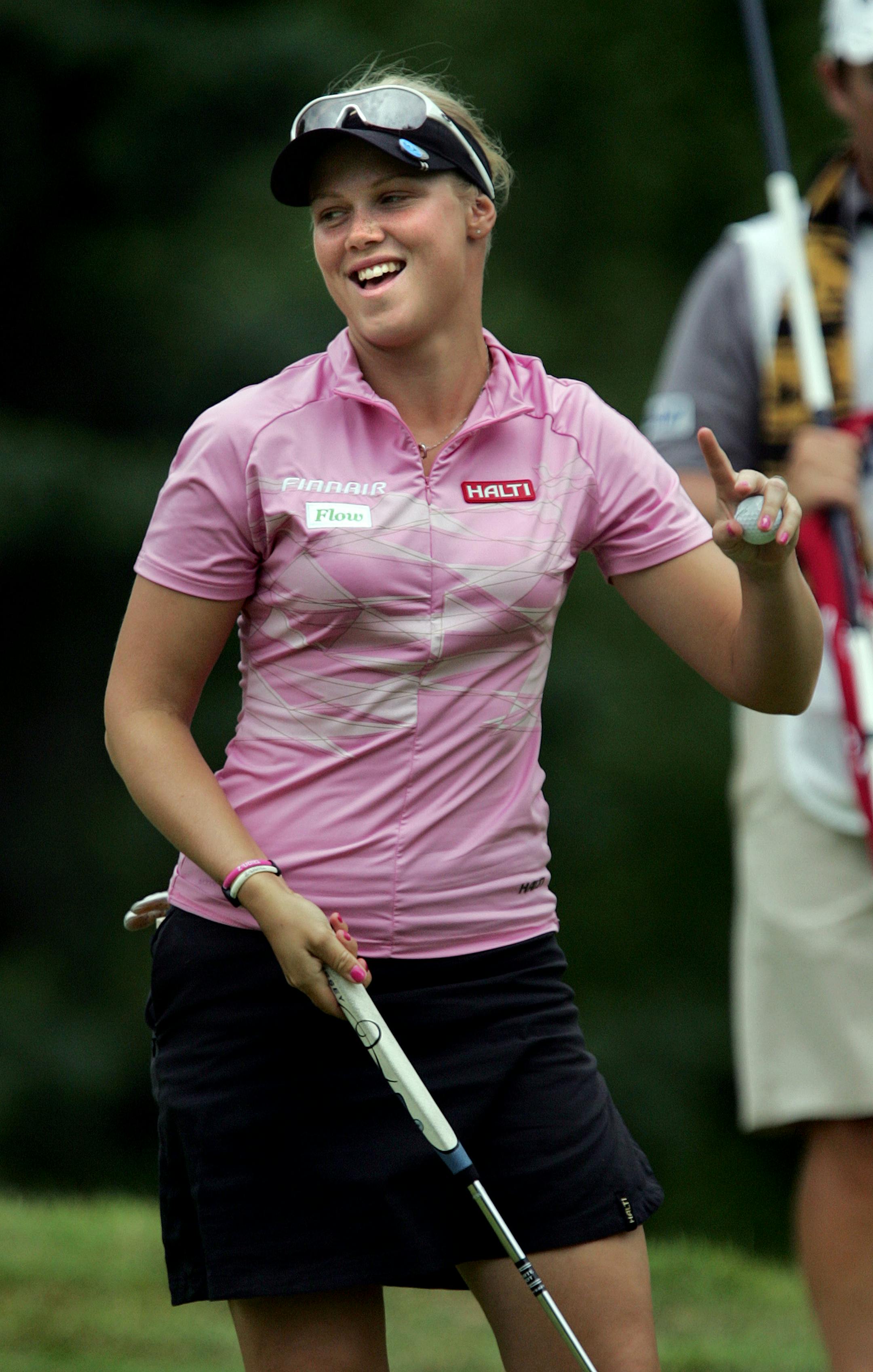 Blomqvist reacted after making par at No. 3 Friday. The 23-year-old ended the day at 5 under par. She admits that golf isn't terribly popular in her native country. "There aren't many of us in Finland," she said. "There isn't much attention paid to golf. Maybe if I keep doing well here, it will be worth a short story in the newspaper."