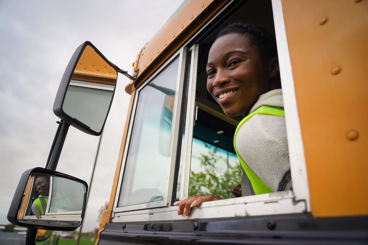 Brihanna Sims tidied up her bus between routes in Brooklyn Center, Minn., on Wednesday, Oct. 13, 2021.