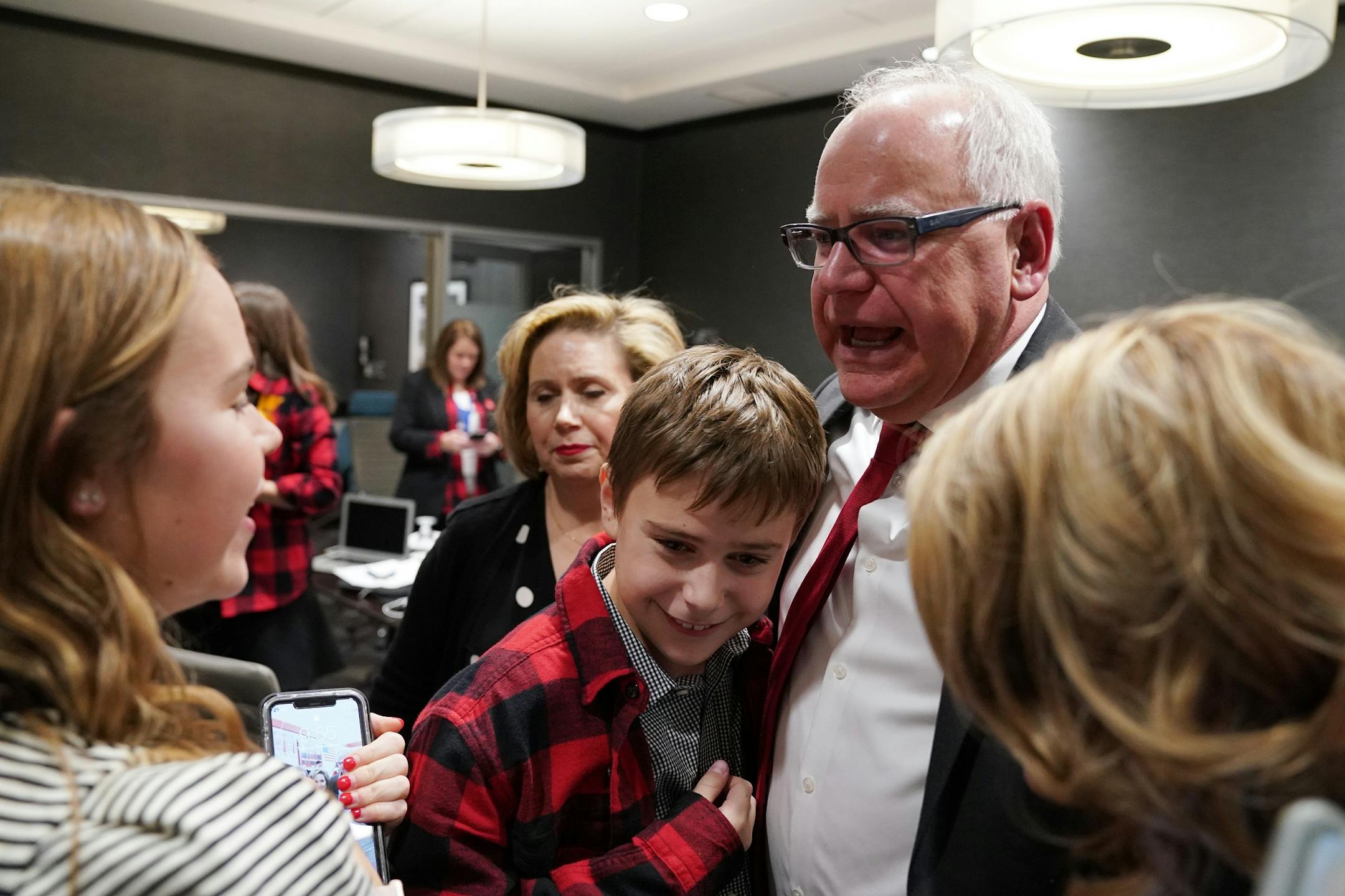 DFL gubernatorial candidate Tim Walz hugged his family after it was projected he'd win Tuesday night.