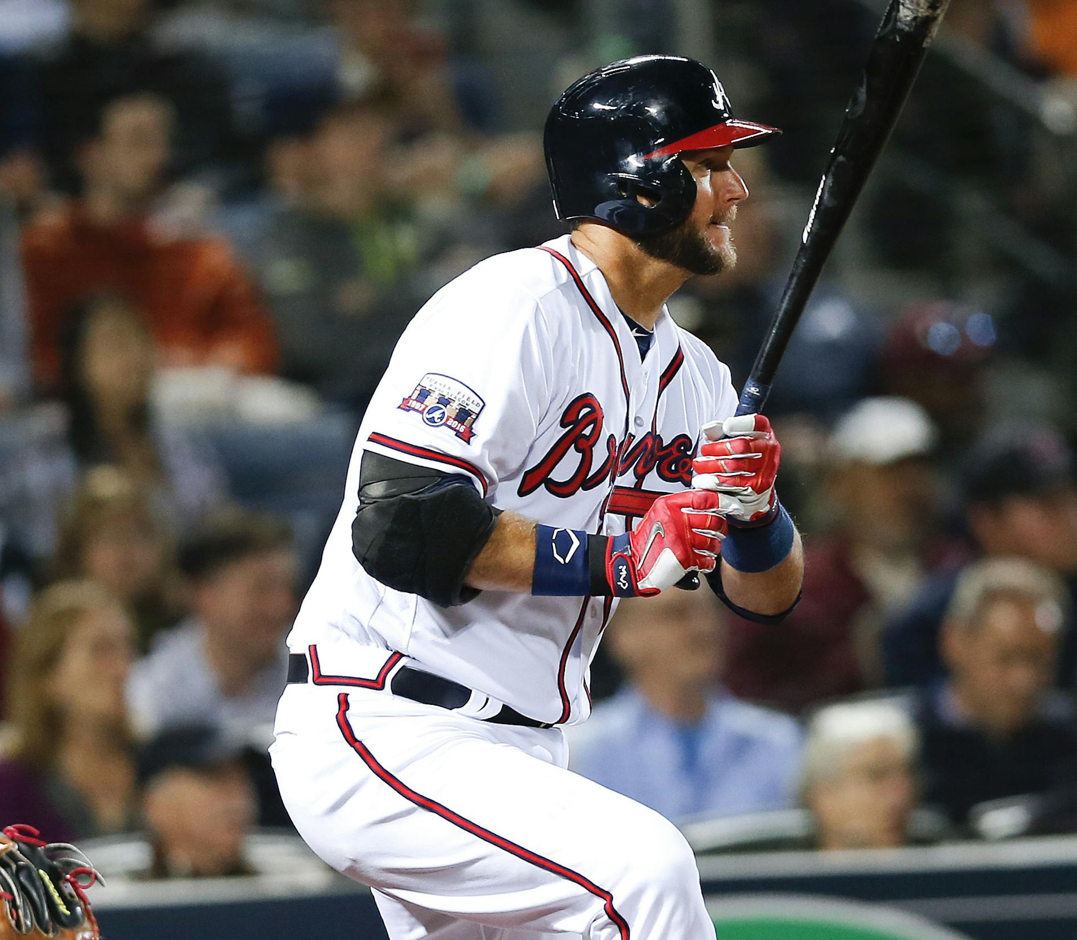 Atlanta Braves catcher A.J. Pierzynski (15) drives in a run with a base hit in the fourth inning of a baseball game against the Washington Nationals Wednesday, April 6, 2016, in Atlanta. Pierzynski was tagged out at second base. (AP Photo/John Bazemore) ORG XMIT: MIN2016041522444056