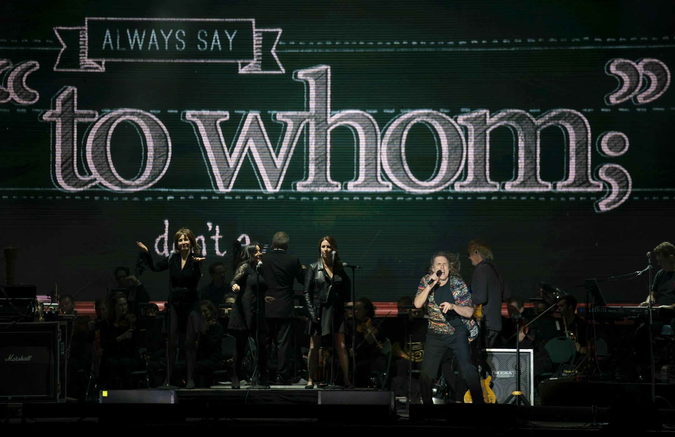 Weird Al Yankovic performing his song Word Crimes early in his set Tuesday night at the Grandstand.