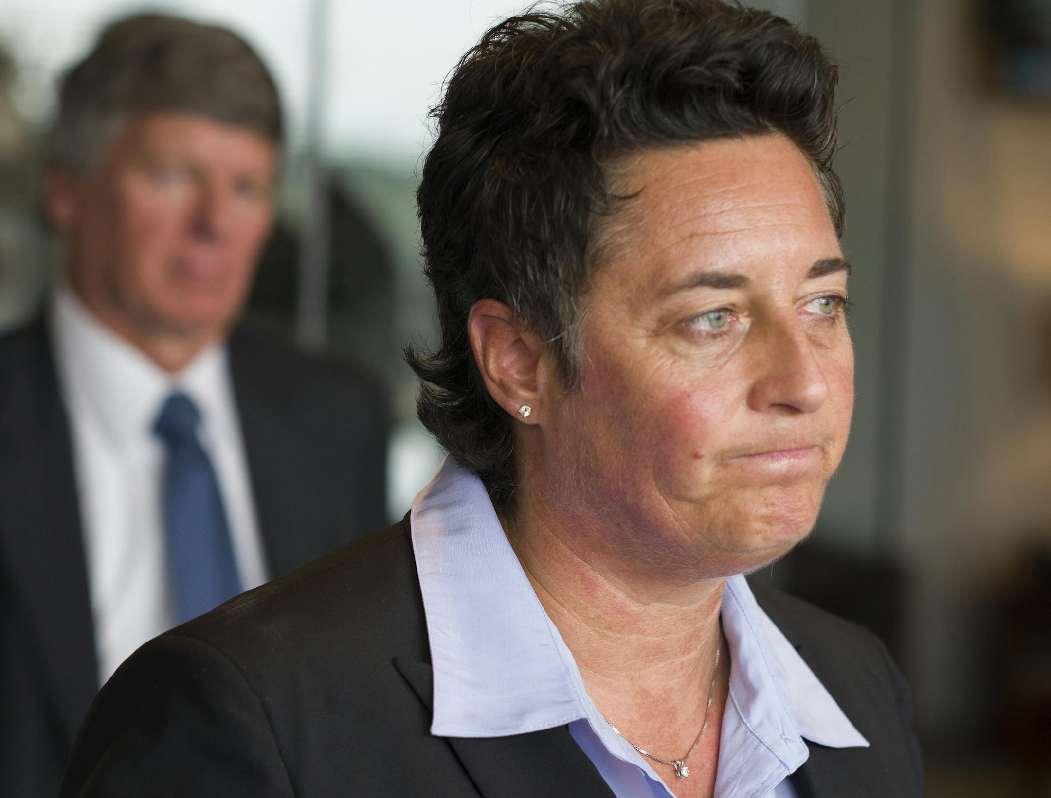 At the law offices of Fafinski Mark & Johnson, former UMD women hockey coach Shannon Miller described a pattern of discrimination, the reason she and two other coaches are bringing suit against the Board of Regents of the University of Minnesota. Two of the lawyers are Donald Mark Jr.(blue tie) .] Richard Tsong-Taatarii/rtsong-taatarii@startribune.com