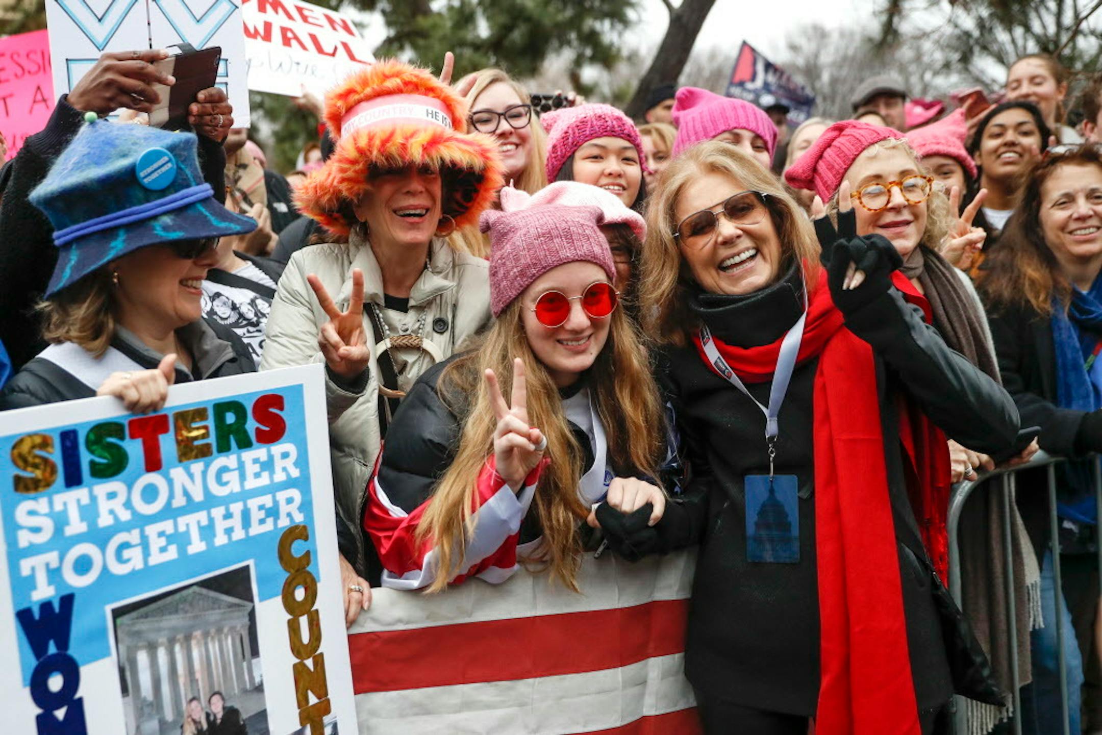 In this Jan. 21, 2017 photo, Gloria Steinem greets protesters at the barricades before speaking at the Women's March on Washington during the first full day of Donald Trump's presidency, in Washington. Organizers of the January Women's March are calling for women to take the day off and encouraging them not to spend money Wednesday, March 8, 2017.