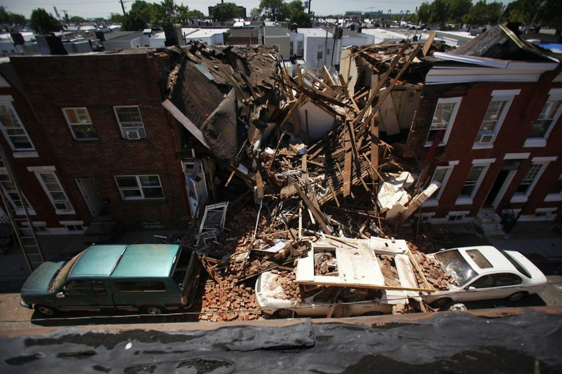 Three rowhouses have been seriously damaged and a number of people have been injured following an apparent gas explosion along the 400 block of Daly Street in South Philadelphia, Pennsylvania, Monday, July 29, 2013.