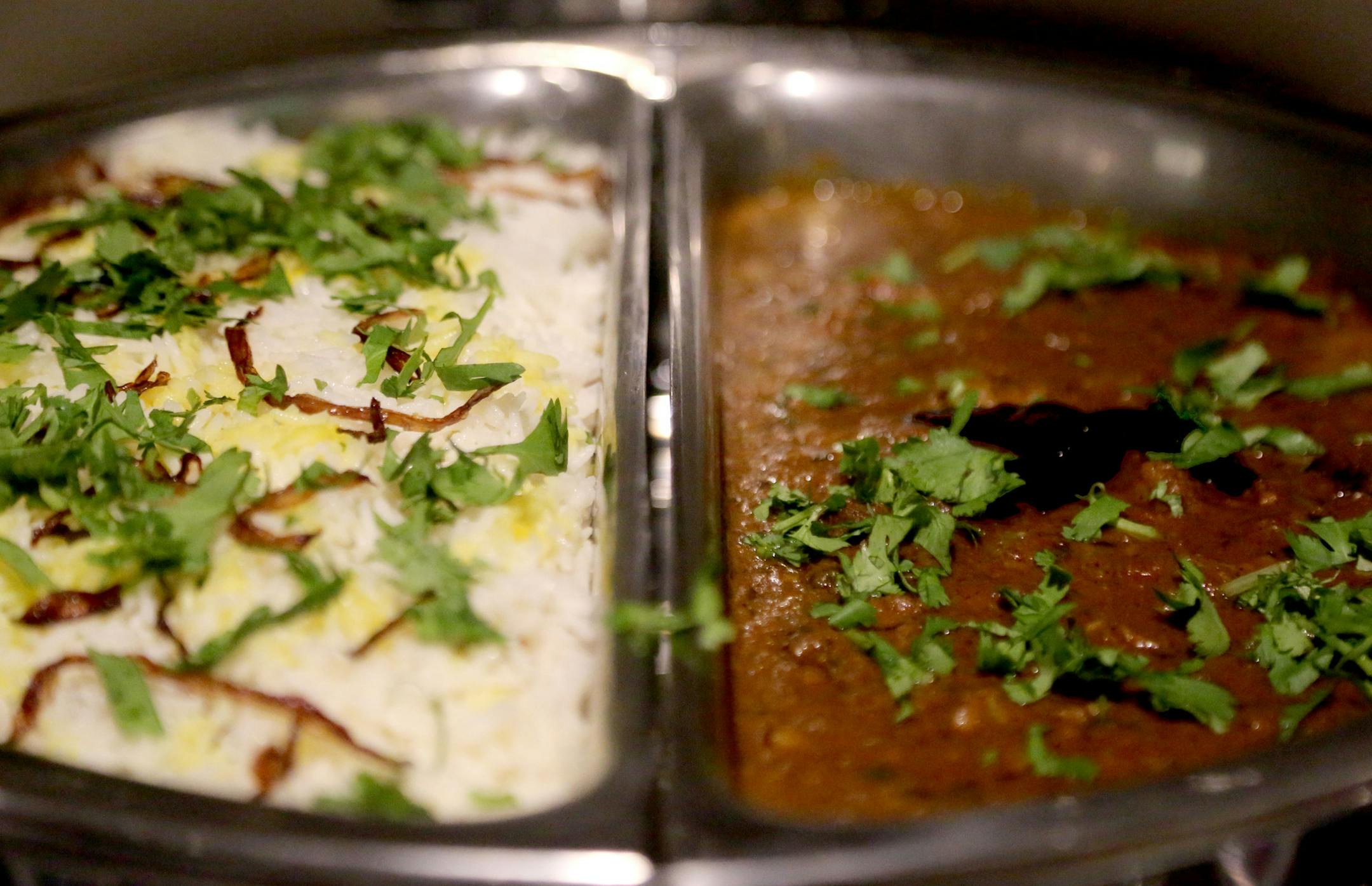 JW Marriott at the Mall of America held a cultural training for employees that focused mostly on Indian Weddings where the average cost in the U.S. is $250,000. Among the lunch fare for the training was chicken biryani, left, and lamb rogan josh Thursday, May 26, 2016, at the JW Marriott at the Mall of America in Bloomington, MN.](DAVID JOLES/STARTRIBUNE)djoles@startribuneMarriott International began holding Indian Culture Day training programs at hotels in large cities with large Indian populat