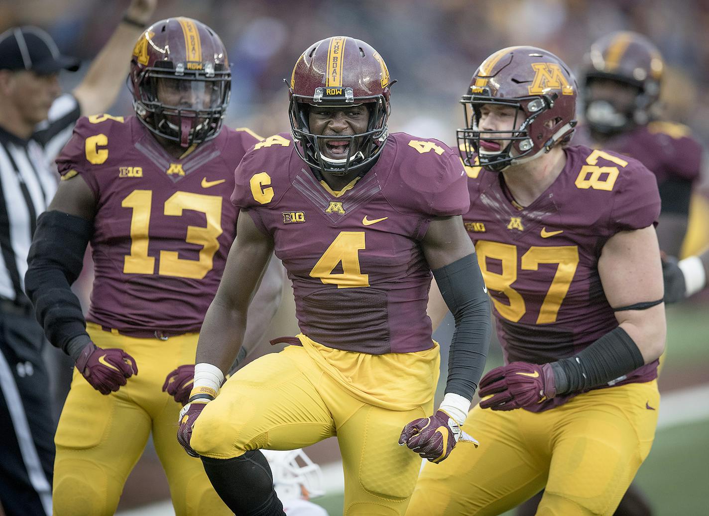 Minnesota's defensive back Adekunle Ayinde celebrated a fourth down turnover during the third quarter the Gophers took on Illinois at TCF Bank Stadium, Saturday, October 21, 2017 in Minneapolis, MN. ] ELIZABETH FLORES &#xef; liz.flores@startribune.com