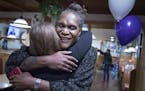 Andrea Jenkins hugs a supporter as she won the Minneapolis Ward 8: Council Member race in Minneapolis on Tuesday, Nov. 7, 2017. (Carlos Gonzalez/Star 