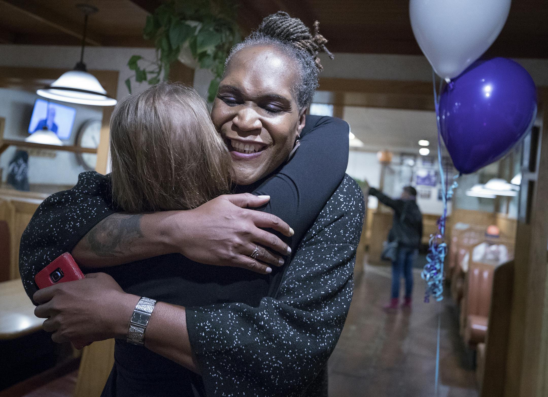 Andrea Jenkins hugs a supporter as she won the Minneapolis Ward 8: Council Member race in Minneapolis on Tuesday, Nov. 7, 2017. (Carlos Gonzalez/Star Tribune via AP)