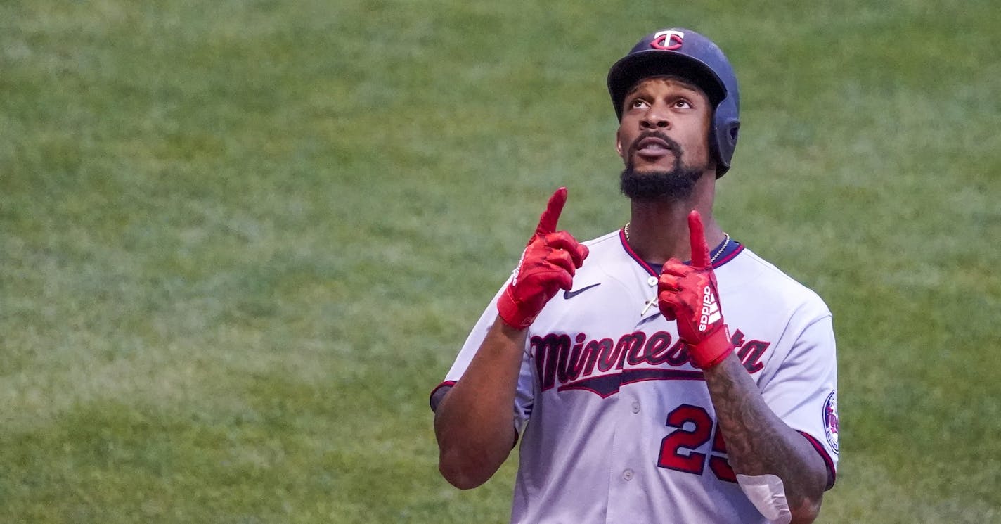 Minnesota Twins' Byron Buxton celebrates after hitting a home run during the fifth inning of a baseball game against the Milwaukee Brewers Wednesday, Aug. 12, 2020, in Milwaukee. (AP Photo/Morry Gash)