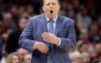 Minnesota Timberwolves head coach Tom Thibodeau yells instructions to players in the first half of an NBA basketball game against the Cleveland Cavali