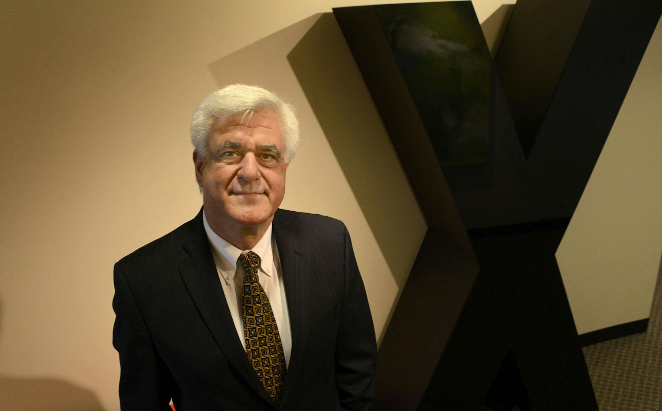 Antonis Papadourakis, chief executive of Lanxess North America, in his office. He has held the post at the Germany-based specialty chemicals business since last July. (Darrell Sapp/Pittsburgh Post-Gazette/TNS) ORG XMIT: 1187443