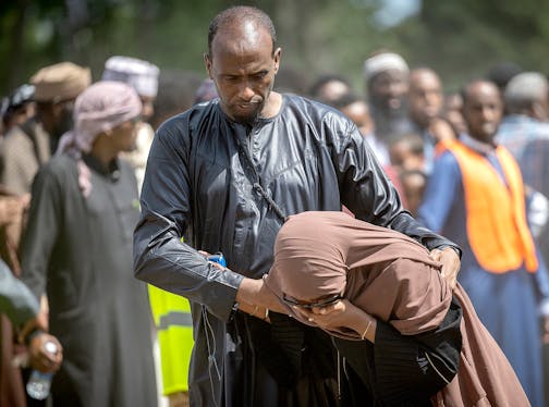 Family members comfort each other as they attend the funeral of the five women killed in a car crash on Lake Street, at the Garden of Eden Islamic Cemetery in Burnsville, Minn., on Monday, June 19, 2023.  ] Elizabeth Flores • liz.flores@startribune.com