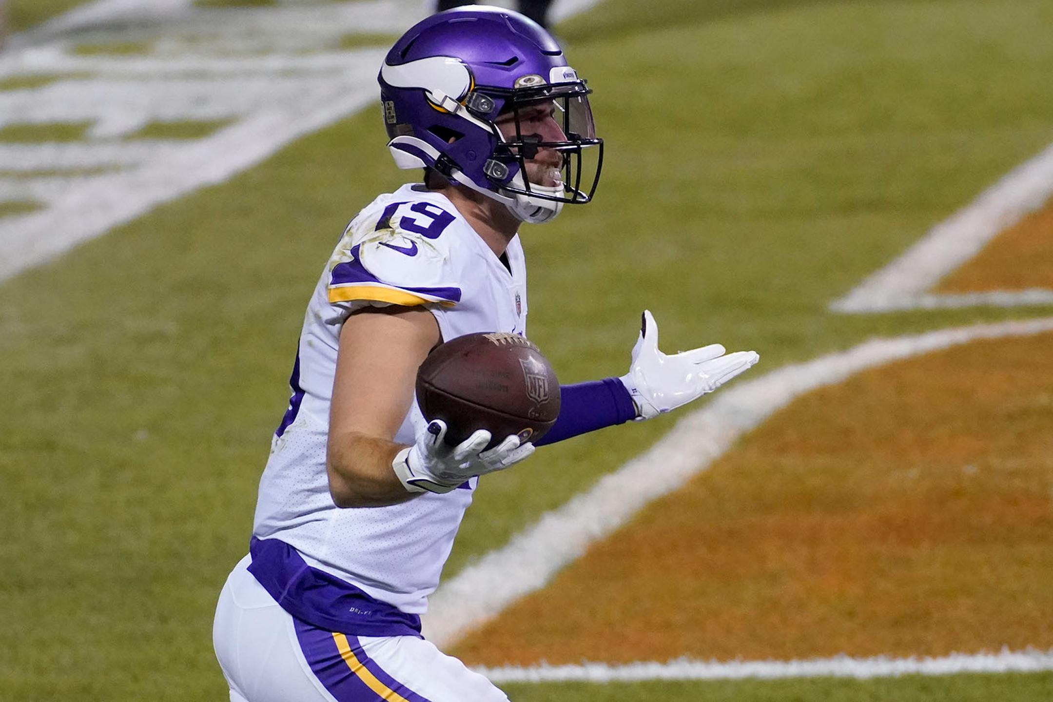 Minnesota Vikings wide receiver Adam Thielen (19) celebrates after catching a touchdown pass during the first half of an NFL football game against the Chicago Bears Monday, Nov. 16, 2020, in Chicago. (AP Photo/Charles Rex Arbogast)