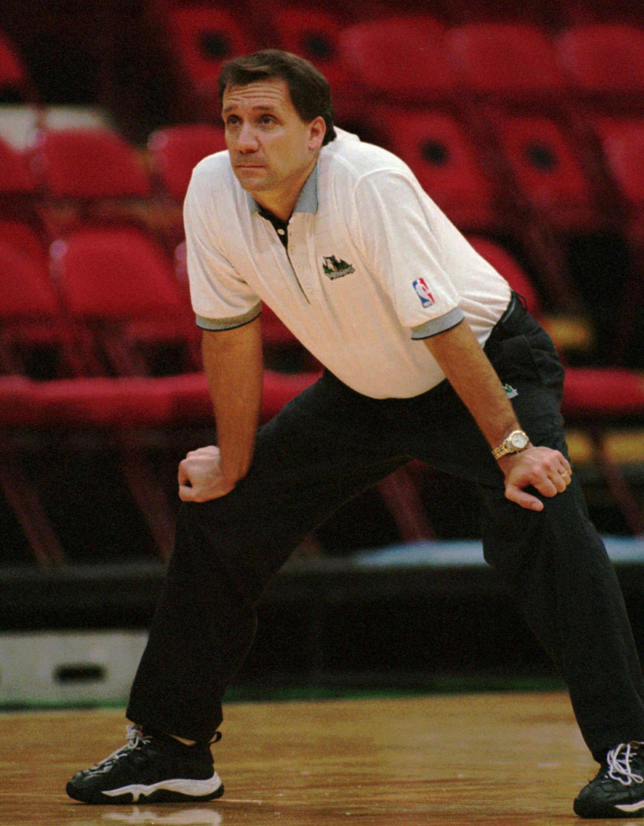 Minnesota Timberwolves head coach Flip Saunders watches his team practice in Minneapolis on Oct. 3, 1997. When the Wolves begin the season Friday night Oct. 31, they will be hard-pressed to improve on last season's franchise-best 40-42 record despite the fact they paid Kevin Garnett $126 million because they have no center. (AP Photo/Ann Heisenfelt)