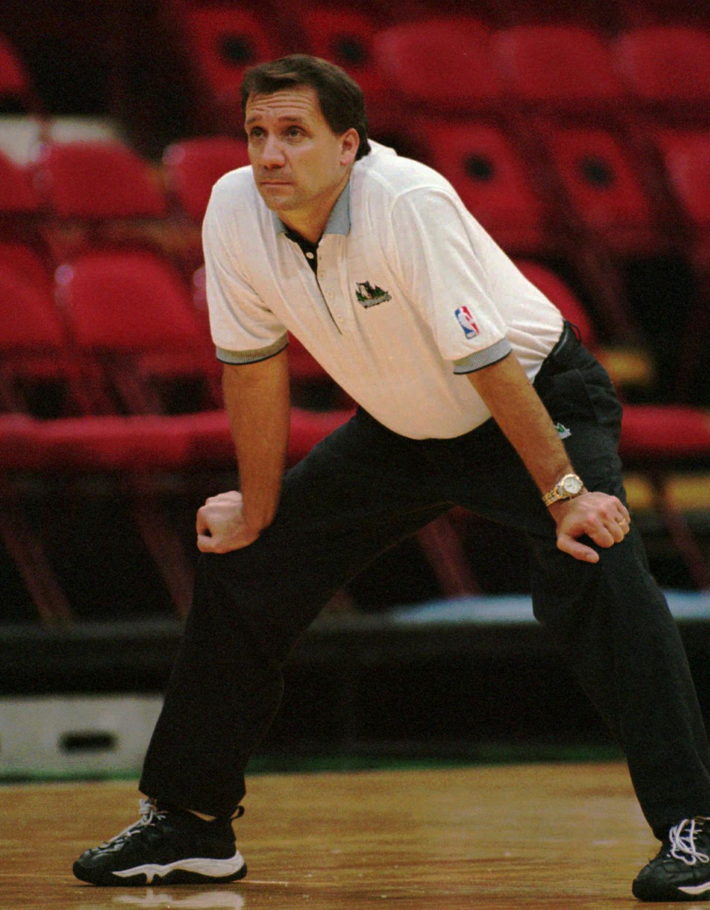 Minnesota Timberwolves head coach Flip Saunders watches his team practice in Minneapolis on Oct. 3, 1997. When the Wolves begin the season Friday night Oct. 31, they will be hard-pressed to improve on last season's franchise-best 40-42 record despite the fact they paid Kevin Garnett $126 million because they have no center. (AP Photo/Ann Heisenfelt)