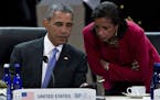 U.S. President Barack Obama, left, talks to Susan Rice, U.S. national security advisor, at the Nuclear Security Summit in Washington, D.C., USA on Fri