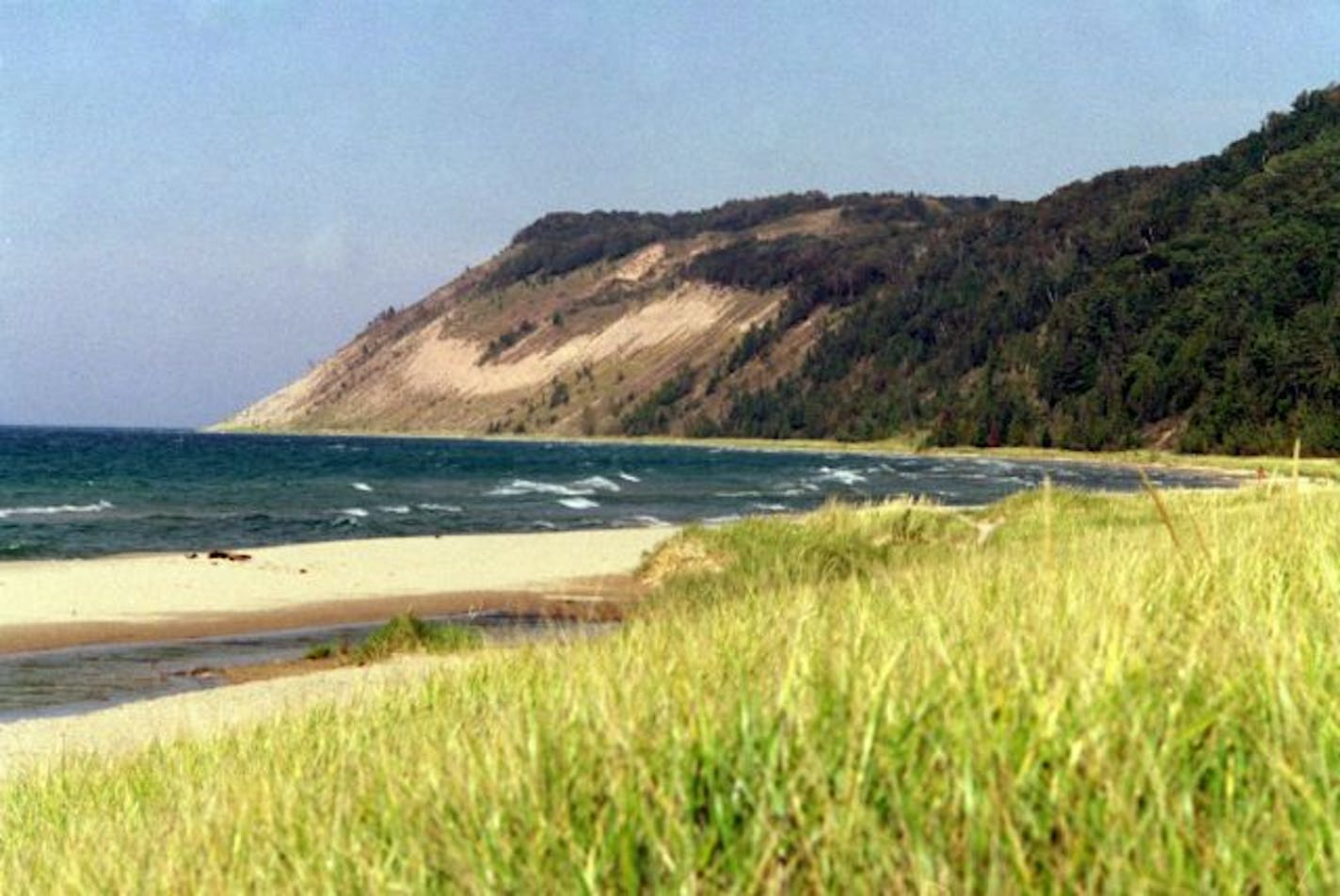 Michigan's Sleeping Bear Dunes National Lakeshore which encompasses a 35-mile stretch of Lake Michigan's eastern coastline. It has beaches and dune formations.