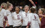 Gophers celebrated their point in the third set during their match up against Purdue at Maturi Pavilion in Minneapolis.