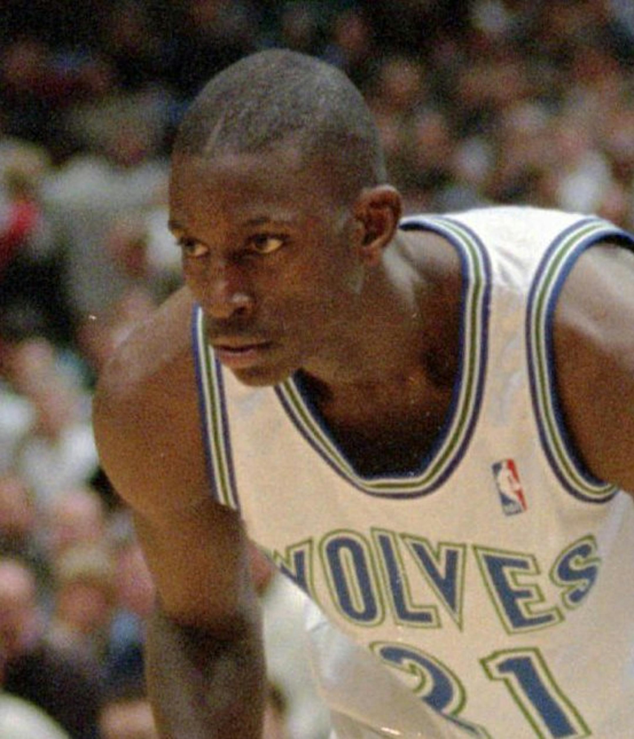 Minnesota Timberwolves rookie forward Kevin Garnett heads toward the basket in the first quarter against the Los Angeles Lakers in Minneapolis, Tuesday night, Nov. 7, 1995. Less than five months out of Chicago's Farragut High School, Garnett already is becoming known for his game face. (AP Photo/Ann Heisenfelt) ORG XMIT: MP106