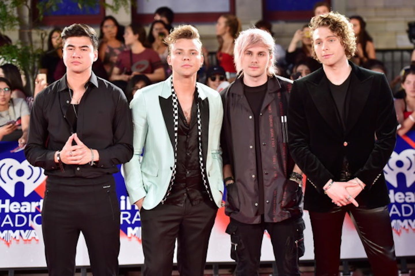 Let's hope 5 Seconds of Summer's members look more thrilled to be at the KDWB Jingle Ball than they did at Toronto's iHeartRadio MMVAs in August. / Frank Gunn, Canadian Press/AP