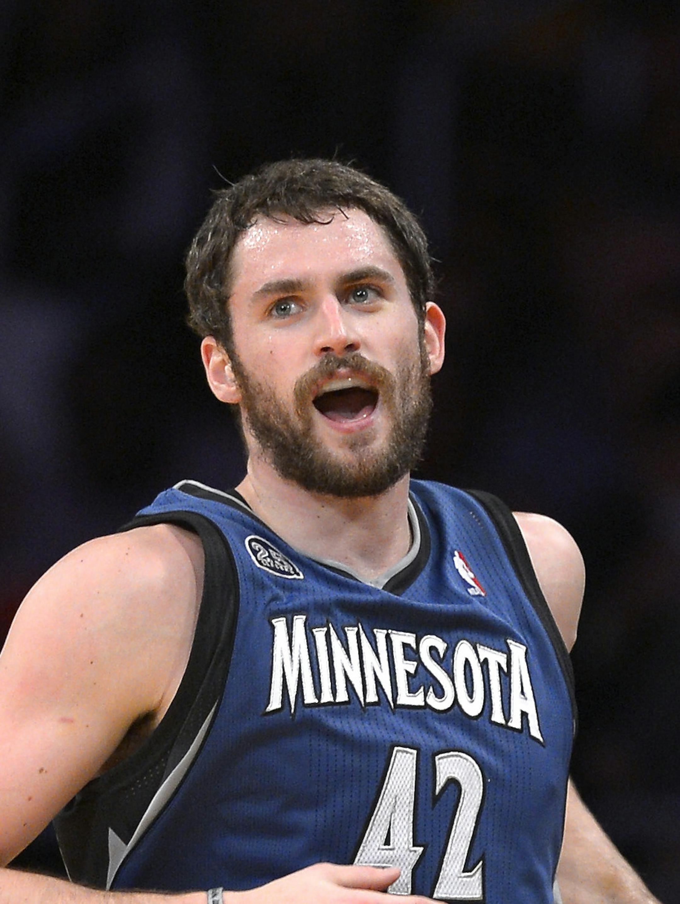 Minnesota Timberwolves forward Kevin Love looks on after scoring during the first half of an NBA basketball game against the Los Angeles Lakers, Sunday, Nov. 10, 2013, in Los Angeles. (AP Photo/Mark J. Terrill) ORG XMIT: NYOTK