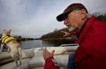 Dave Scheerer, president of the Lake owners association gave us a tour of Lake Alimagneat with his neighbors dog Shasa on March 29, 2012.