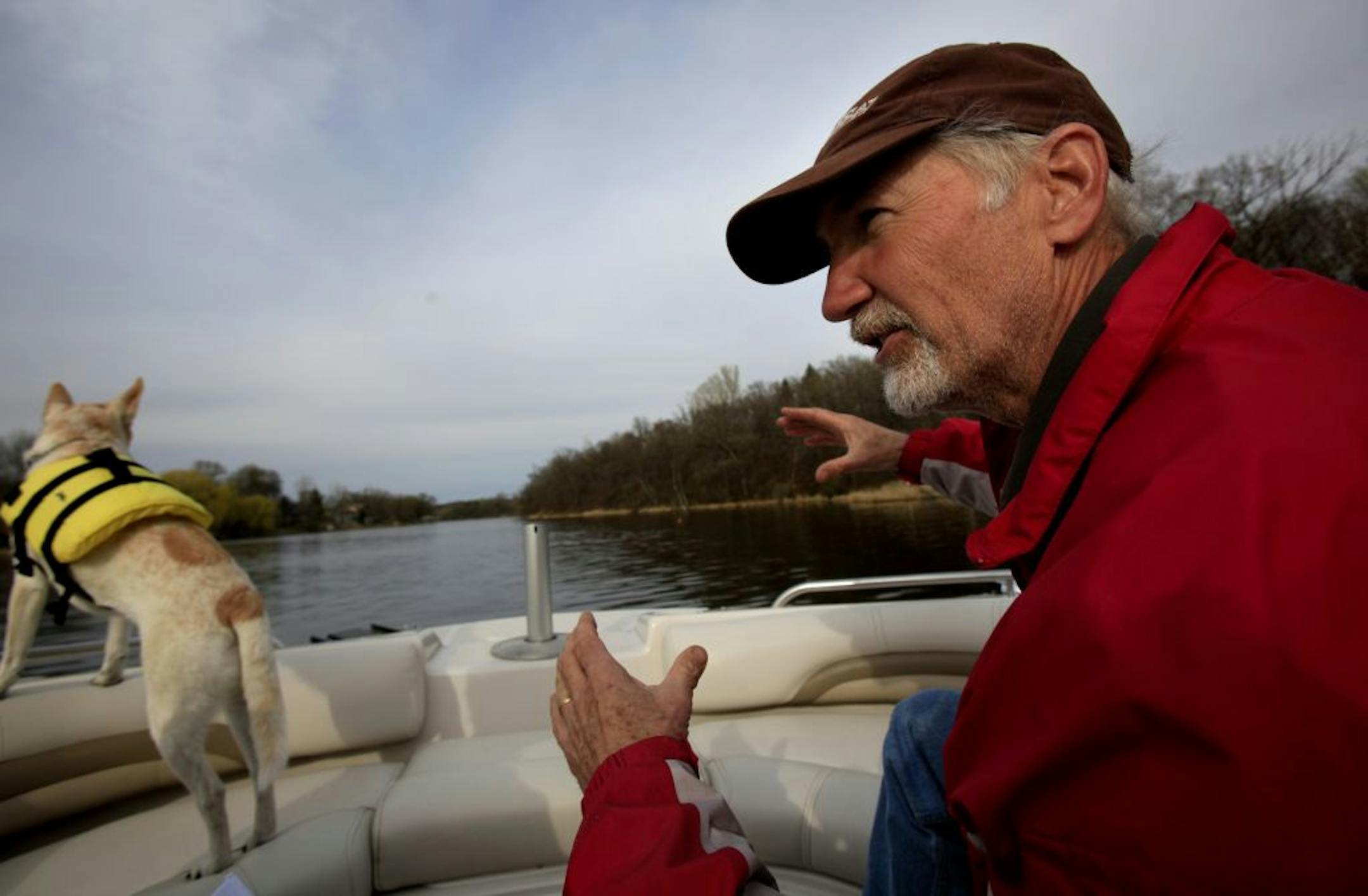 Dave Scheerer, president of the Lake owners association gave us a tour of Lake Alimagneat with his neighbors dog Shasa on March 29, 2012.