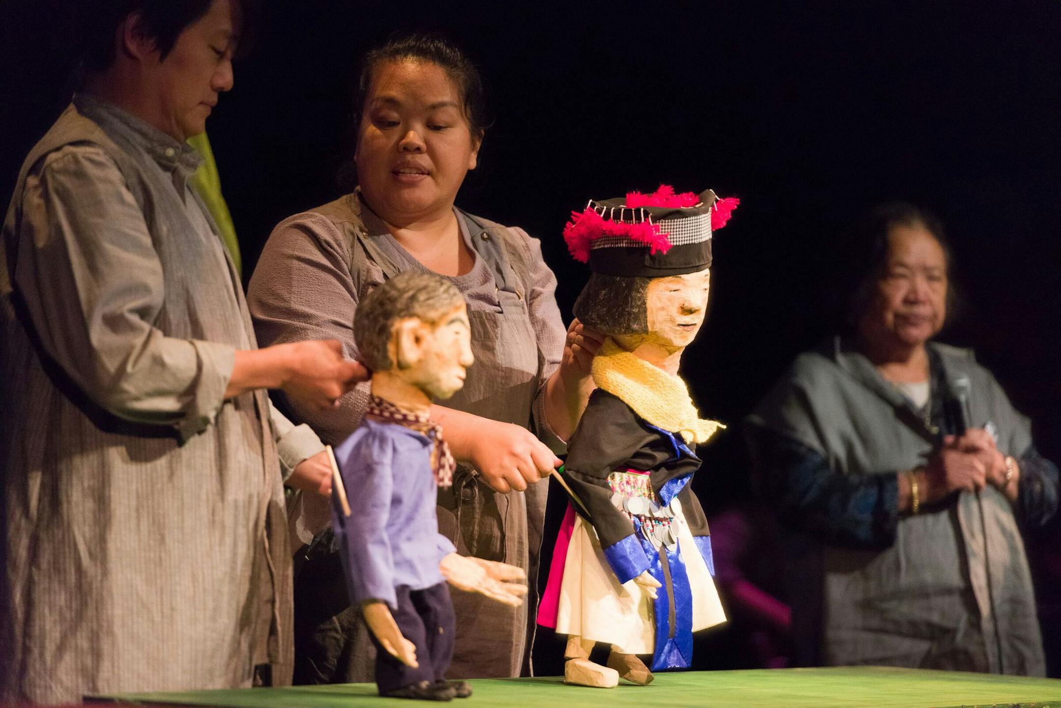 Puppets are used to tell immigrants' stories in Mu Performing Arts' production of Immigrant Journey Project.