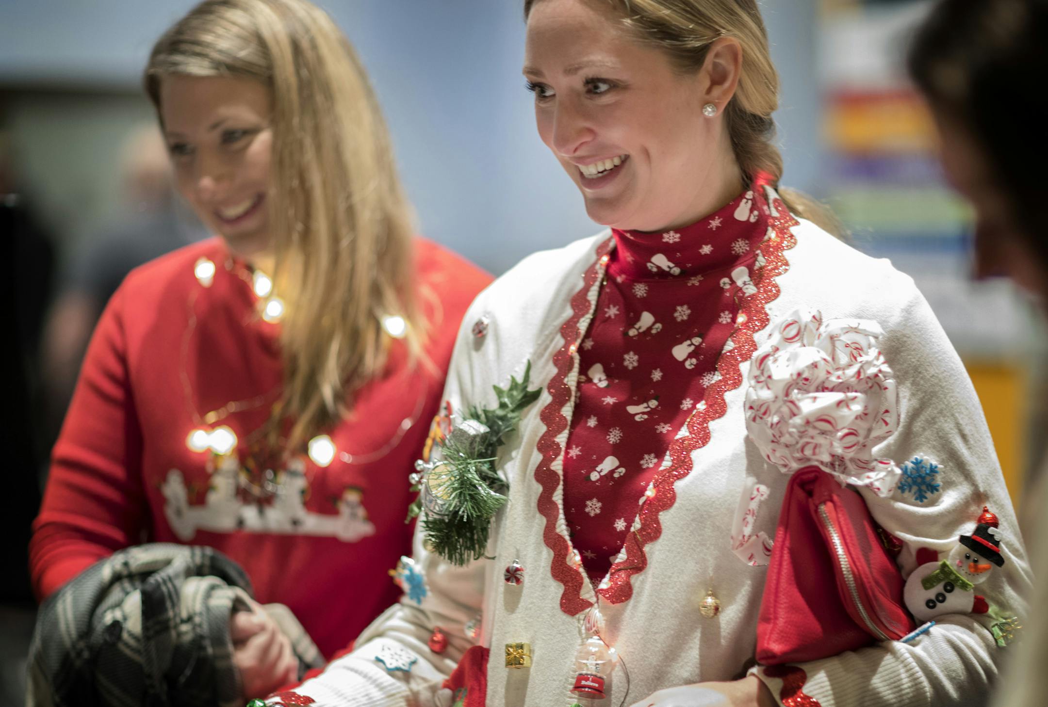 Megahn Hollenbeck and Melinda Rodger of Blaine rocked the tacky look during a party at the Minnesota History Center.