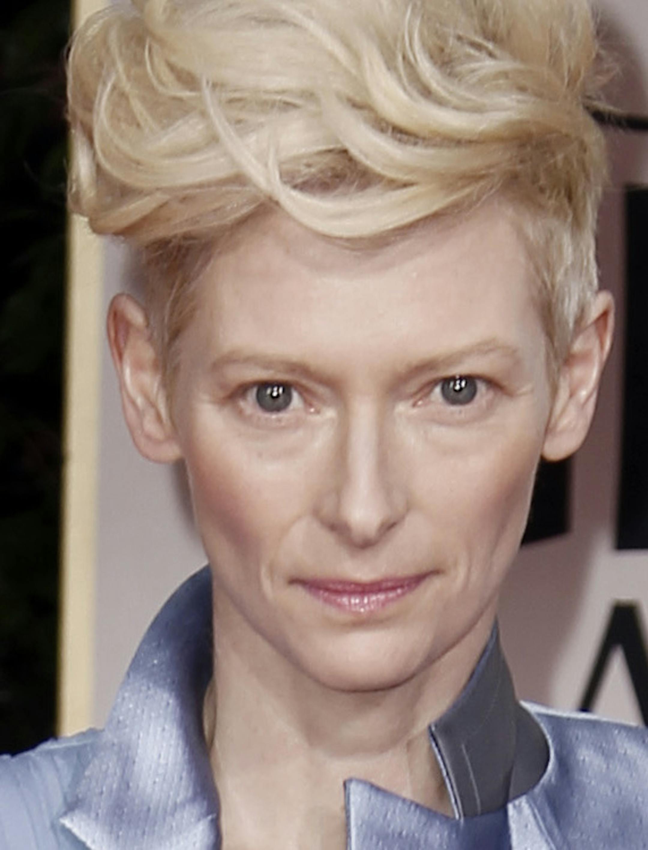 Tilda Swinton arrives at the 69th Annual Golden Globe Awards Sunday, Jan. 15, 2012, in Los Angeles. (AP Photo/Matt Sayles)