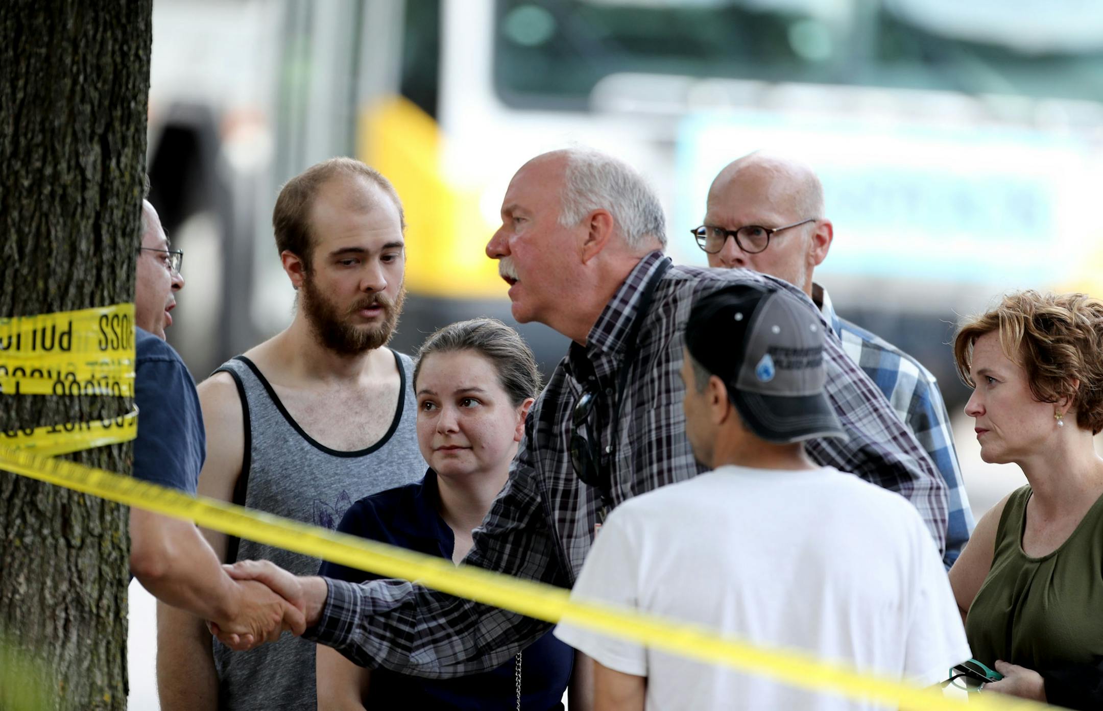 At least one person is dead following an explosion and building collapse at Minnehaha Academy. Here, Minneapolis mayor Betsy Hodges, right, meets with concerned family members near the site of the explosion Wednesday, Aug. 2, 2017, in Minneapolis, MN.